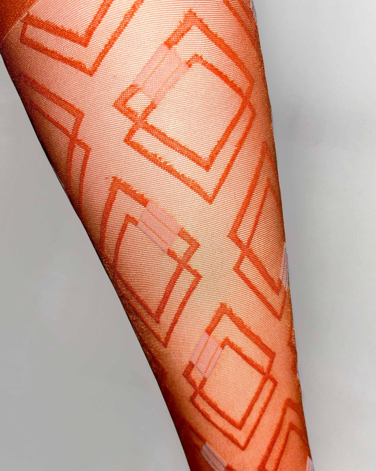 Omsa Poison Gambaletto - Sheer orange nude fashion knee-high socks with a woven geometric diamond style pattern with white square shapes and a plain comfort cuff.