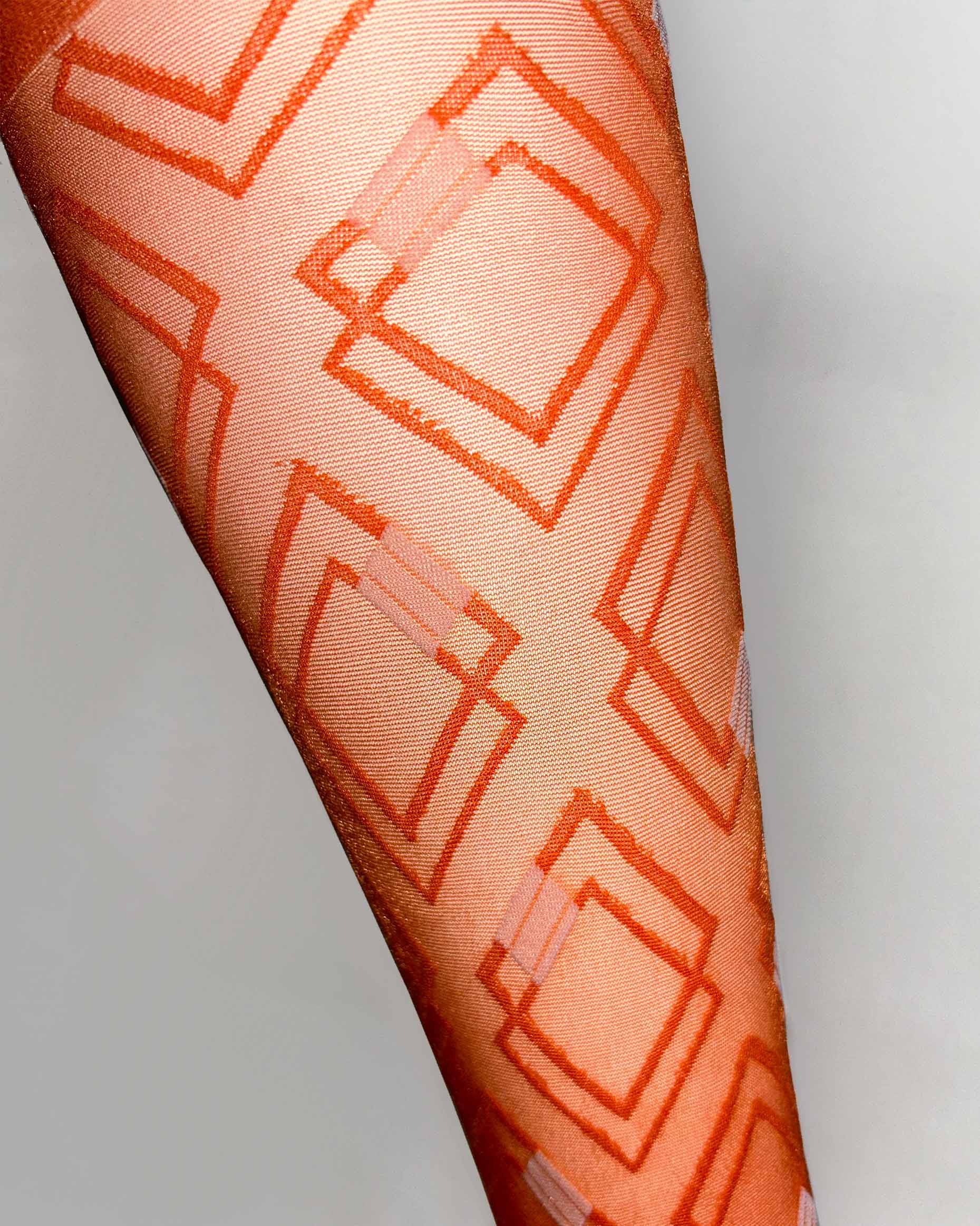 Omsa Poison Gambaletto - Sheer orange nude fashion knee-high socks with a woven geometric diamond style pattern with white square shapes and a plain comfort cuff.