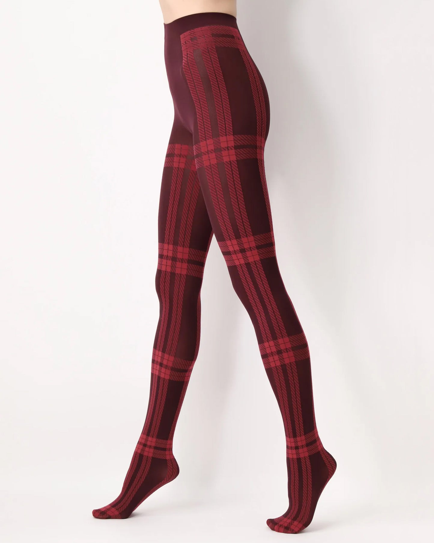 Oroblù All Colors Scottish Tights - Soft opaque fashion tights with a woven tartan style pattern, gusset and soft comfort waist band in red and wine. Side view.