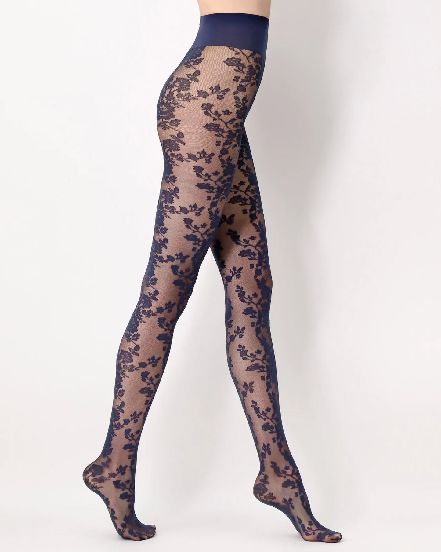 Oroblù Classy Lace Tights - Sheer navy blue micro-mesh fashion tights with a woven floral lace pattern, flat seams, gusset and deep elasticated waist band. Side view.