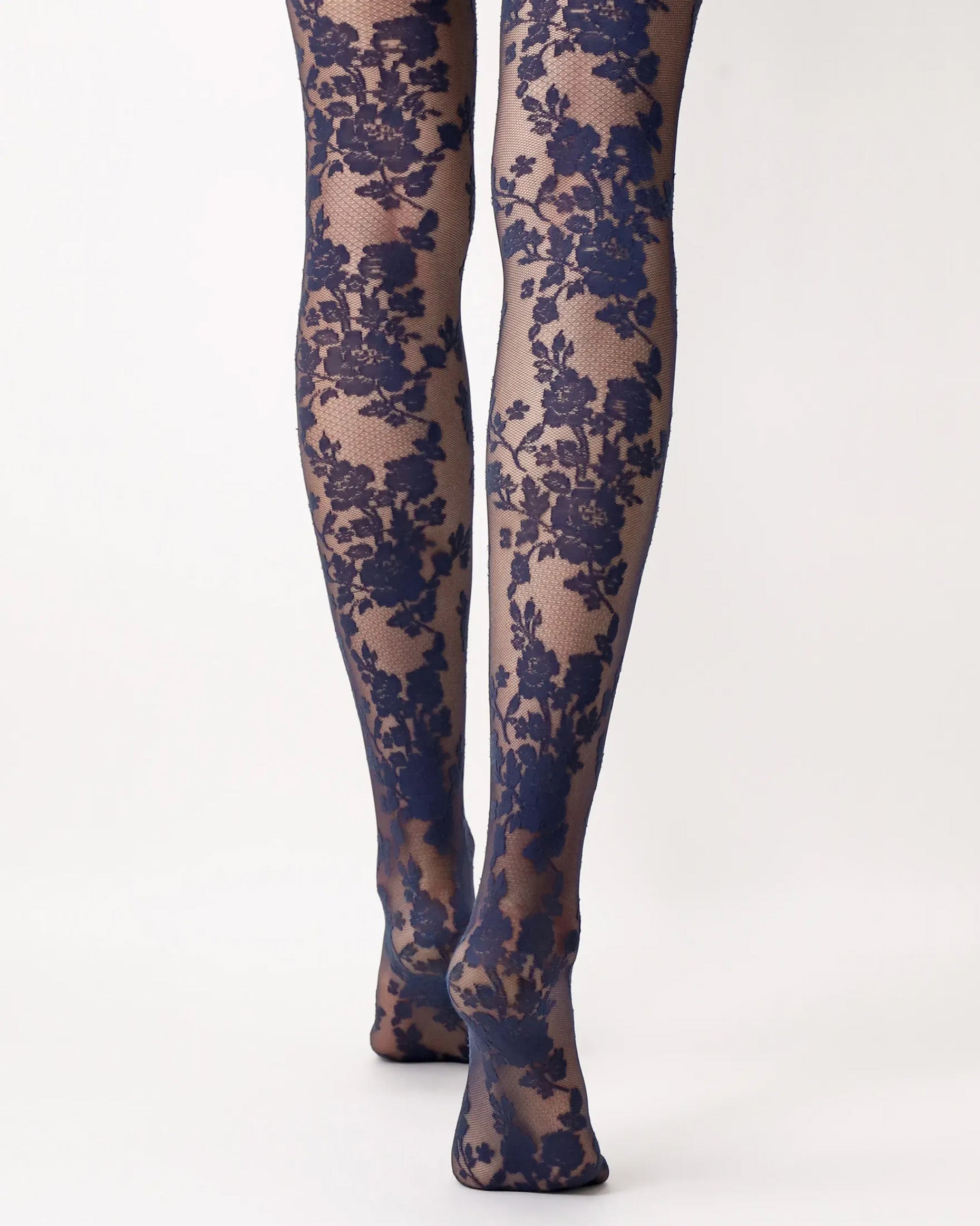 Oroblù Classy Lace Tights - Sheer navy micro-mesh fashion tights with a woven floral lace pattern, flat seams, gusset and deep elasticated waist band. Back view.