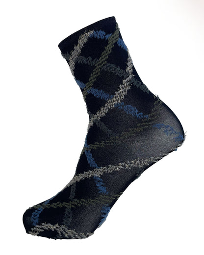 Oroblù Fur Tartan Sock - Black opaque fashion ankle socks with a textured diamond tartan style pattern in khaki green, denim blue, grey and light gold with a plain thin elasticated cuff. Side view