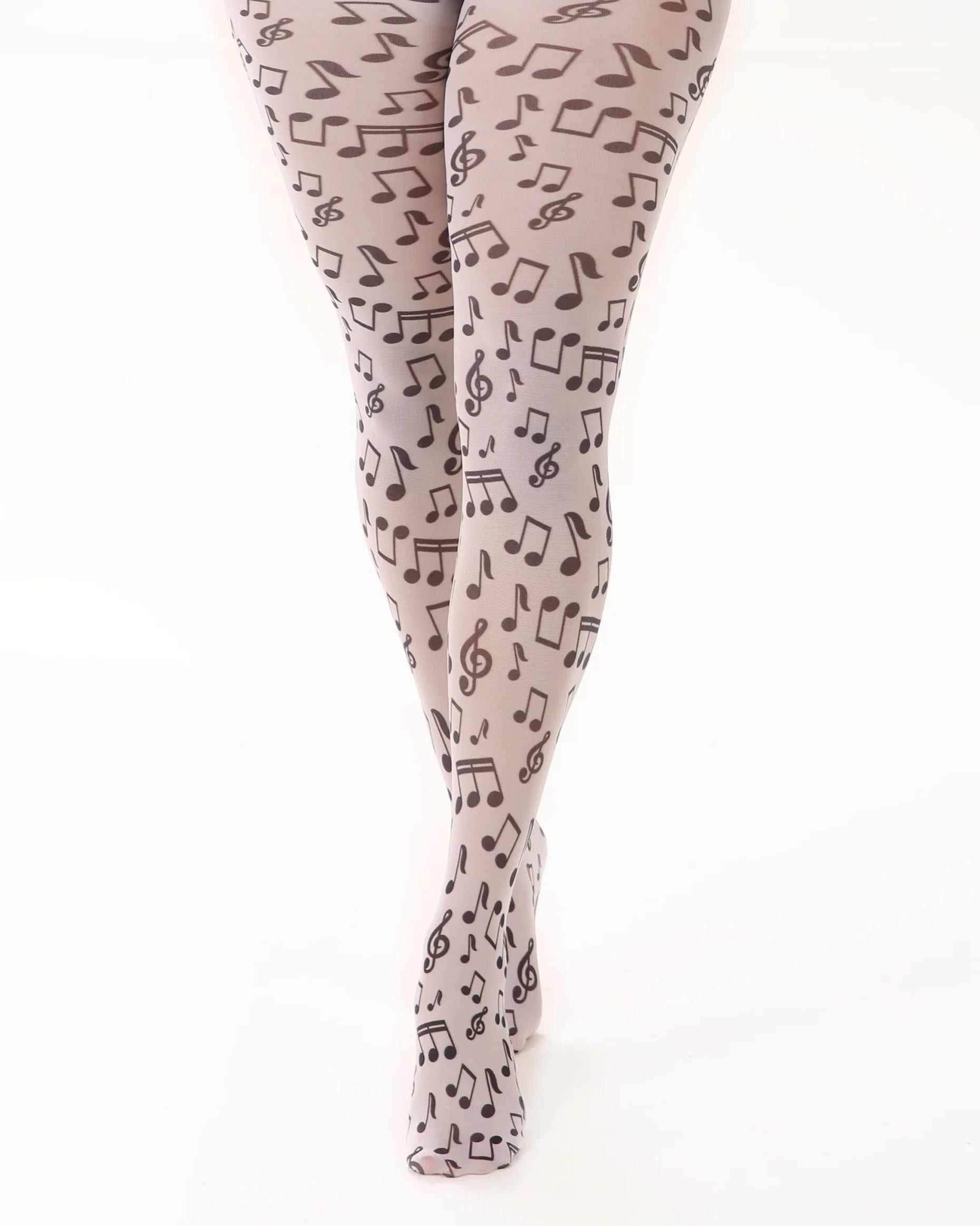 Pamela Mann Musical Notes Print Tights - White opaque tights with an all black music notes print pattern. Close up.