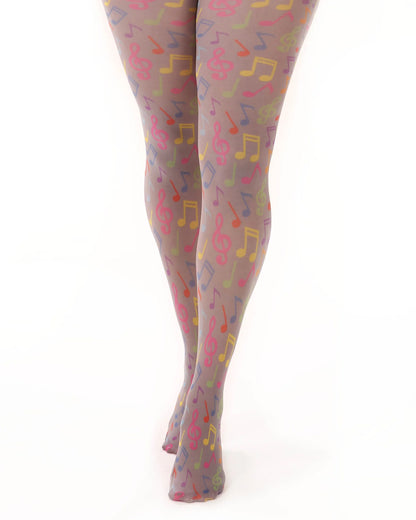 Pamela Mann Musical Notes Print Tights - Grey opaque tights with an all bright multicolured music notes print pattern. Close up.