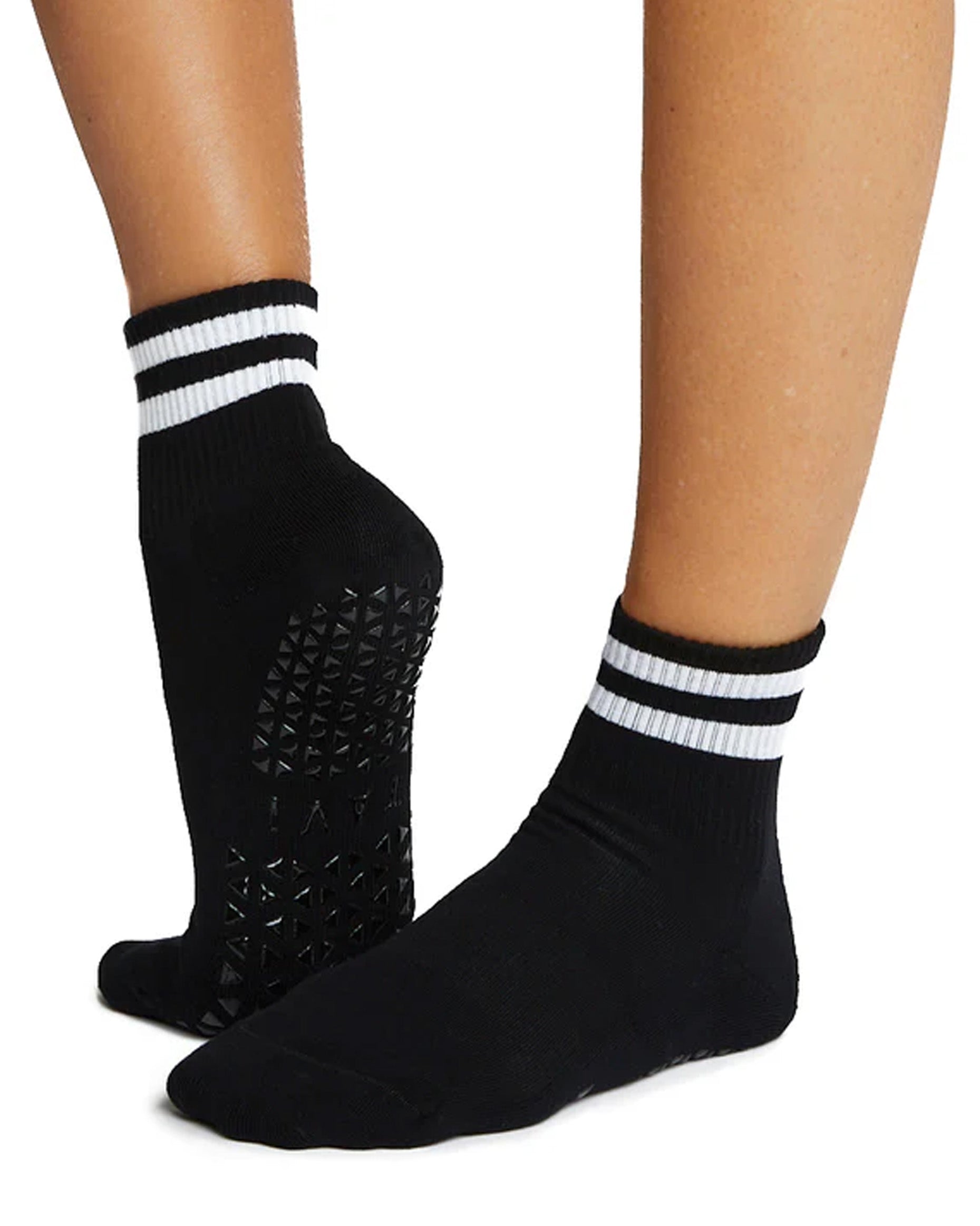 Tavi Noir Aria Sock - Black organic cotton crew length ankle socks with a gripper sole and white double sports stripe cuff.