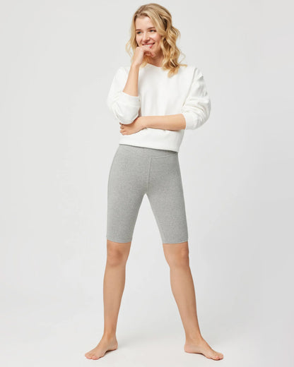 Ysabel Mora 70217 Cotton knee length bicycle shorts in light grey, worn with white sweater.