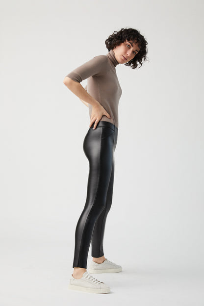 Ysabel Mora 70280 Leggings - Black mid rise faux leather fleece lined trouser leggings with centre seam down the front of the legs, triangular panelling on the hips and darts at the back to ensure a snug fit.