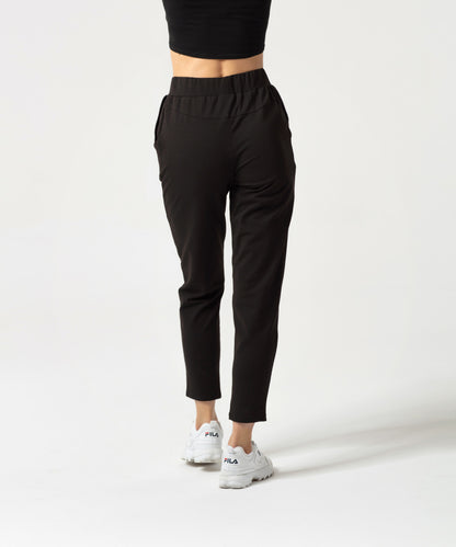 Carpatree Ultimate Tied Sweatpants - Black jogger style tracksuit bottoms with ribbon tie, elasticated waist and pockets. Made of strong stretch cotton.