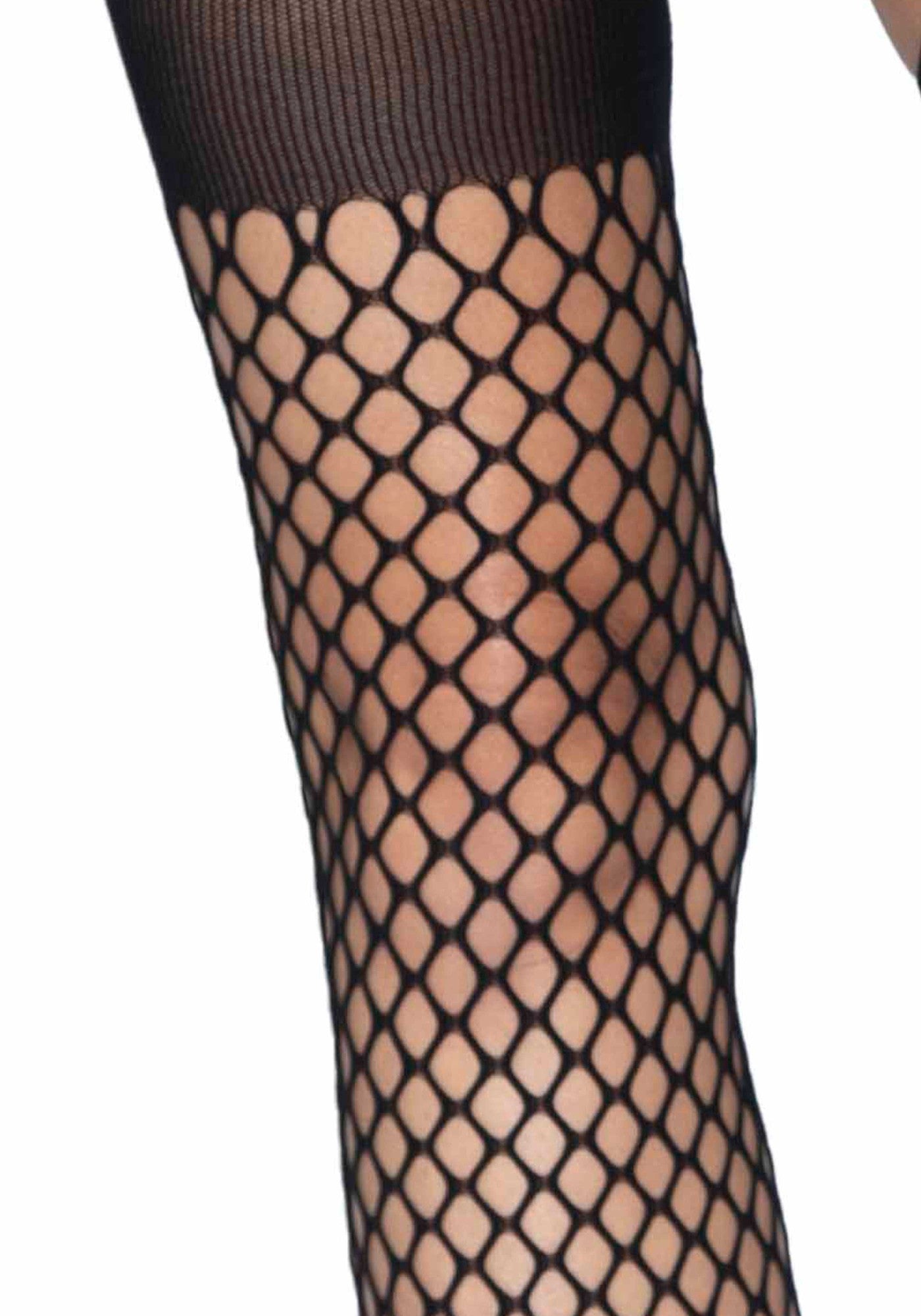 Suspender top fishnet tights