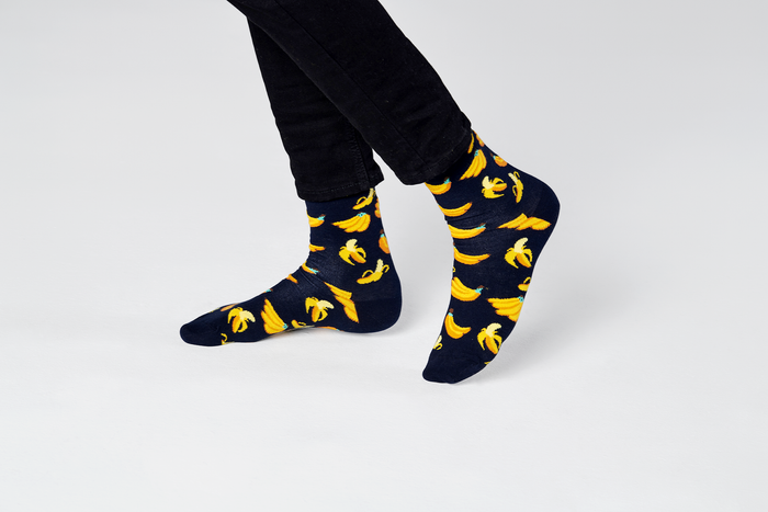 Happy Socks BAN01-6550 Banana Sock - Navy cotton socks with banana pattern worn with black jeans.